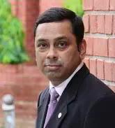 Dr. Prakash Singh