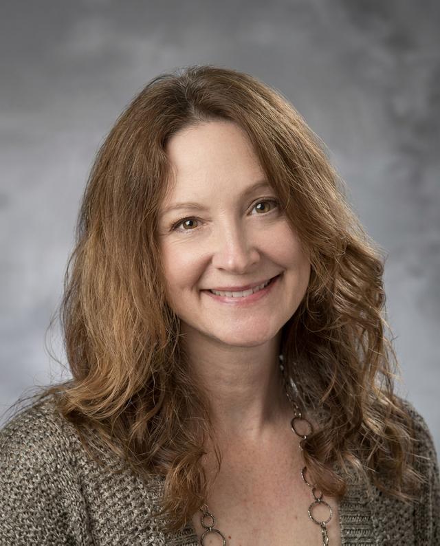 Dr. Denise Comer