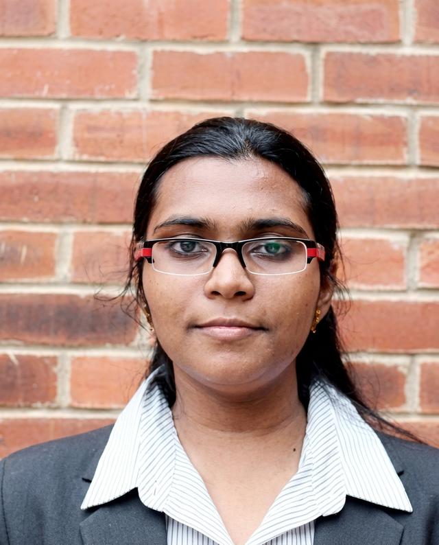Dr. MANJARI MUNDANAD