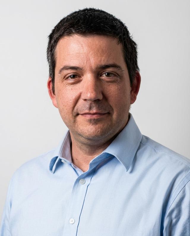 Dr Michele Curioni